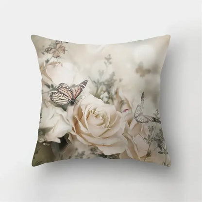 A square butterfly flower pillow with cream roses and beige butterflies in a muted floral design for living room decorbites decor