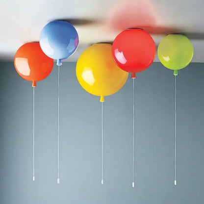 Vibrant glossy balloon pendant light in red yellow blue and green with ceiling installation method for childrens bedroom