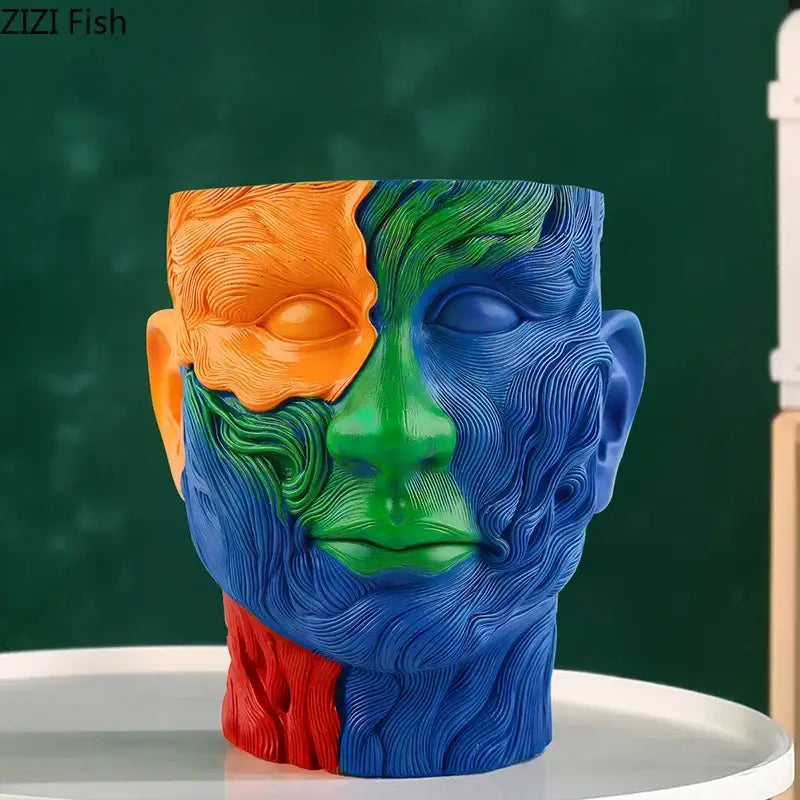 Vibrant human portrait resin vase with multicolored sections holding artificial flowers for living room decorbites colorful human decor