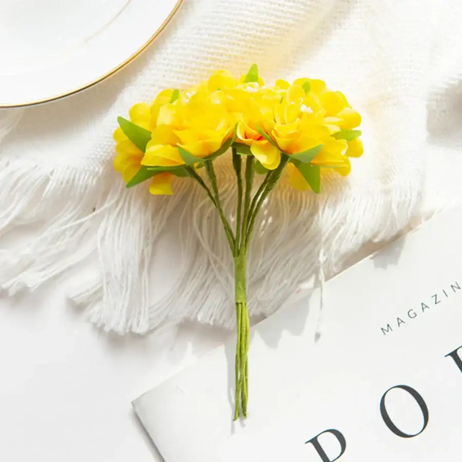 A vibrant yellow artificial flower stamen bouquet with green synthetic stems for living room decor