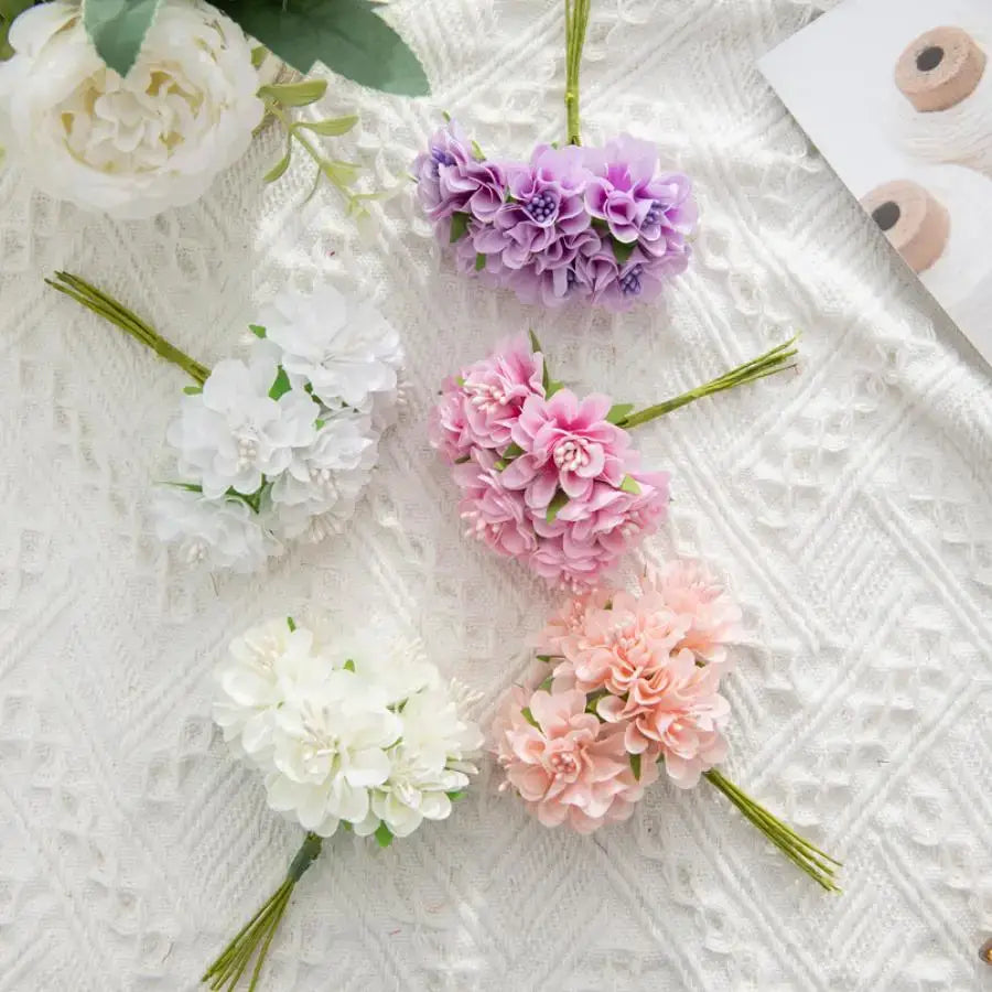 A vibrant multicolor artificial flower stamen bouquet with lavender pink and white hues for living room decor