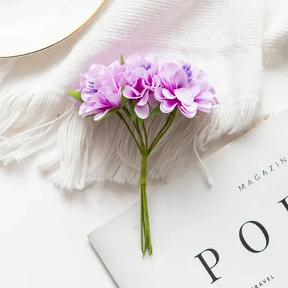 A delicate multicolor artificial flower stamen bouquet with lavender and purple flowers for living room decor