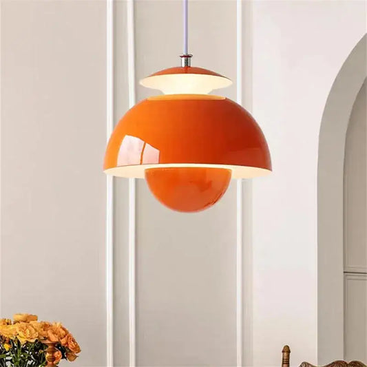Vibrant orange glossy ceramic pendant light with a layered flower design by decorbites designer flower bud for bedroom decor