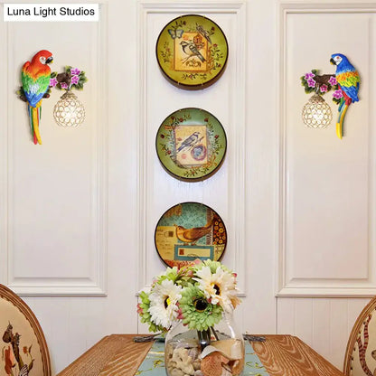 Three decorative vintage bird plates with floral borders complement vibrant parrot wall sconce led light 220v-240v