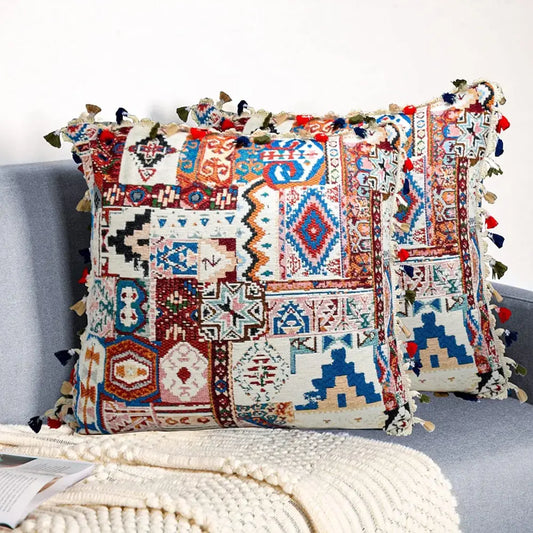 Vibrant patchwork ethnic boho throw pillow cover with geometric tribal patterns and colorful tassels for living room decorbites decor