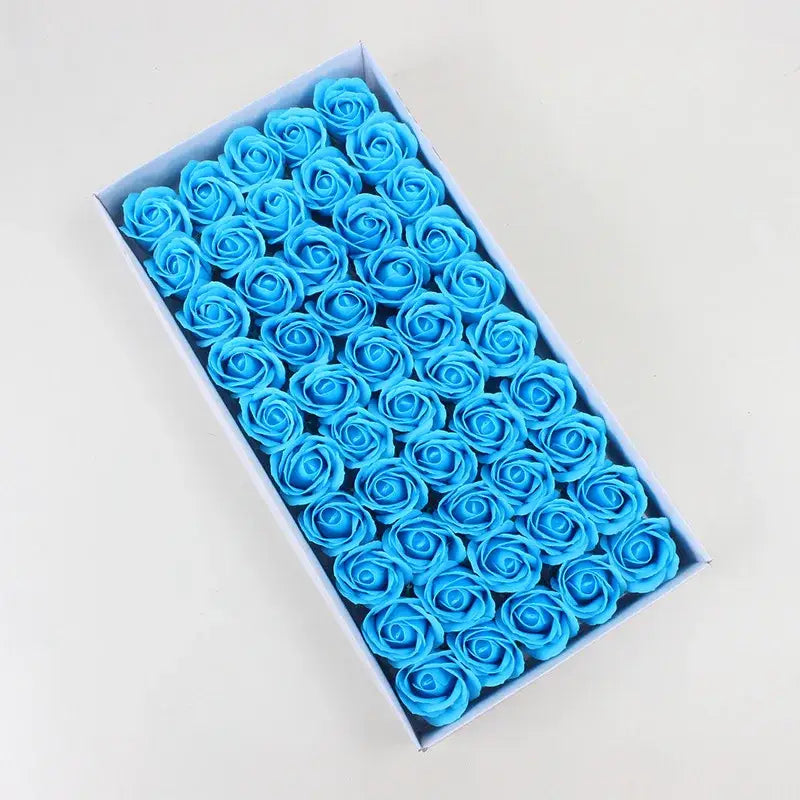 A box of vibrant blue rose-shaped soap flowers from decorbites bath flower set for elegant bathroom decorbites bath