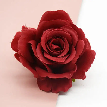 A deep red velvety silk artificial flower with layered petals and green stem for decorbites artificial flowers decor