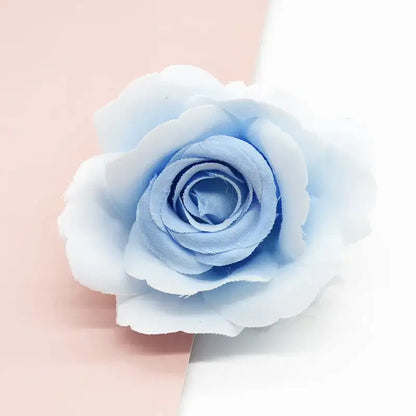 A delicate light blue silk artificial flower with layered petals for vibrant decorbites artificial flowers decor