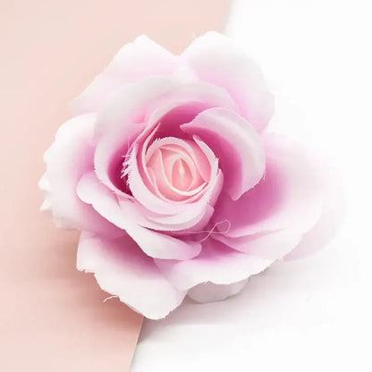 A delicate pink silk artificial flower with layered petals and gradient color for decorbites artificial flowers decor