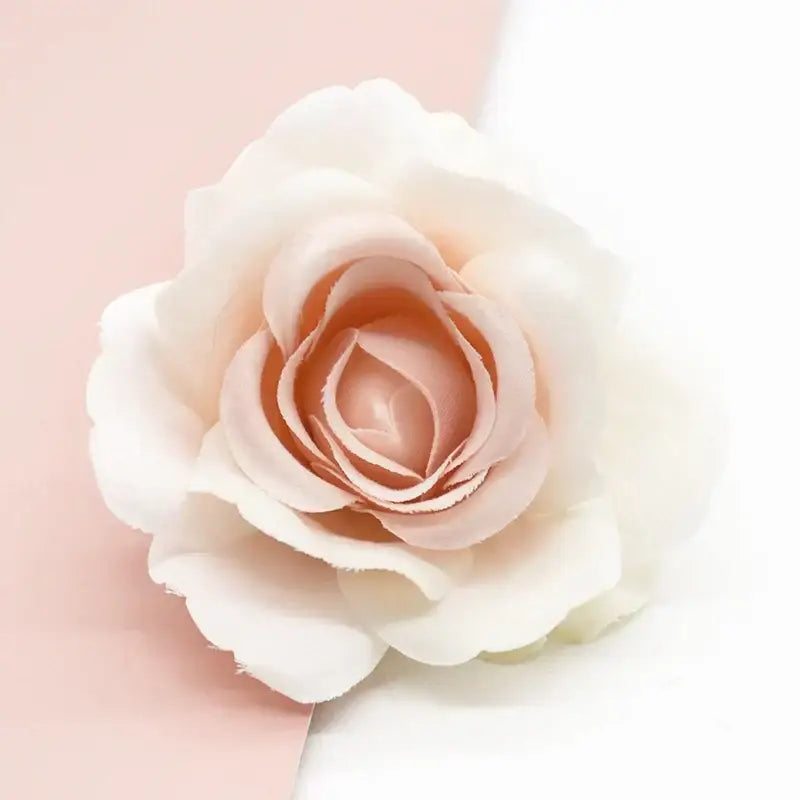 A delicate blush pink silk artificial rose clip made of soft layered fabric for vibrant decorbites artificial flowers decor
