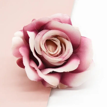 A delicate pink and white vibrants silk artificial rose with layered fabric petals for decorbites artificial flowers decor