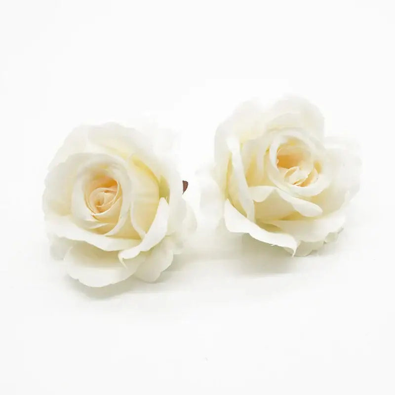 Two delicate ivory silk artificial flowers with layered petals and cream centers for decorbites artificial decorbites artificial