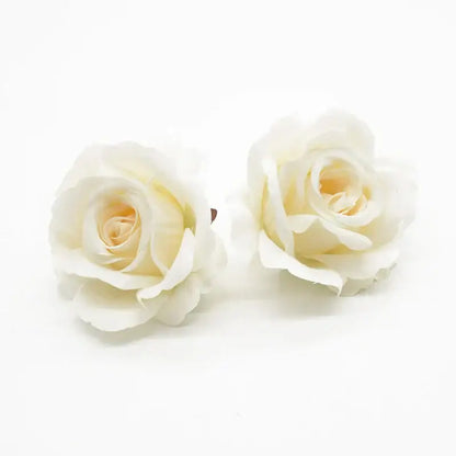Two delicate ivory silk artificial flowers with layered petals and cream centers for decorbites artificial decorbites artificial