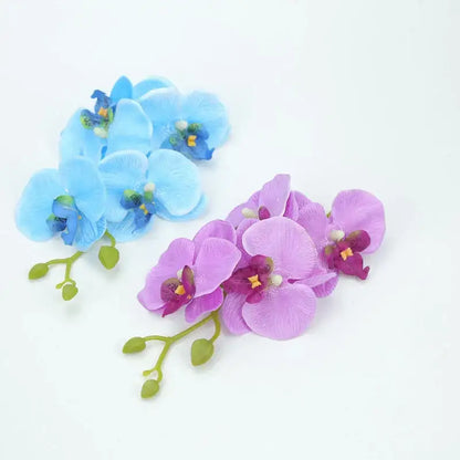 Vibrant silk butterfly orchid bouquet with soft blue and purple artificial flowers and green stems for decor