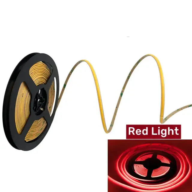 Vibrant slim 4mm cob led strip lights coiled on black spool with yellow led strip lights showing red illumination