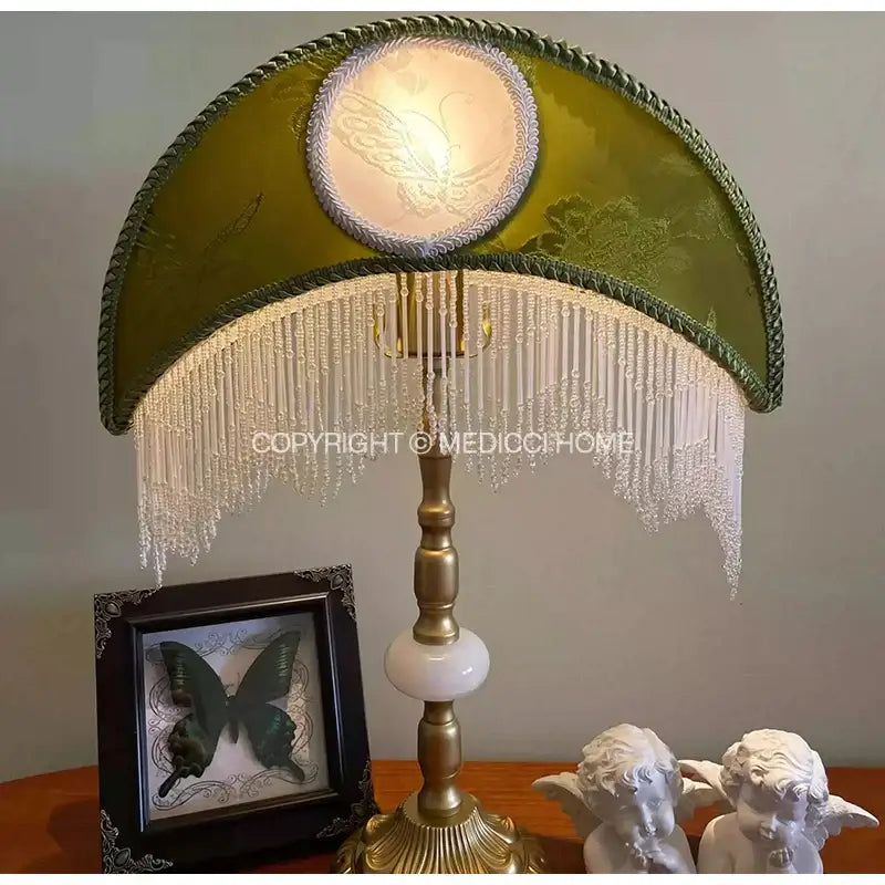 Elegant olive-green velvet Victorian sage crescent moon lampshade table lamp with beaded fringe and embossed butterfly motif
