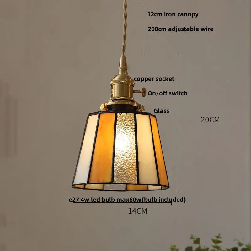 Vintage amber and cream pendant lamp with brass-finished copper socket and decorbites copper knob switch suspension