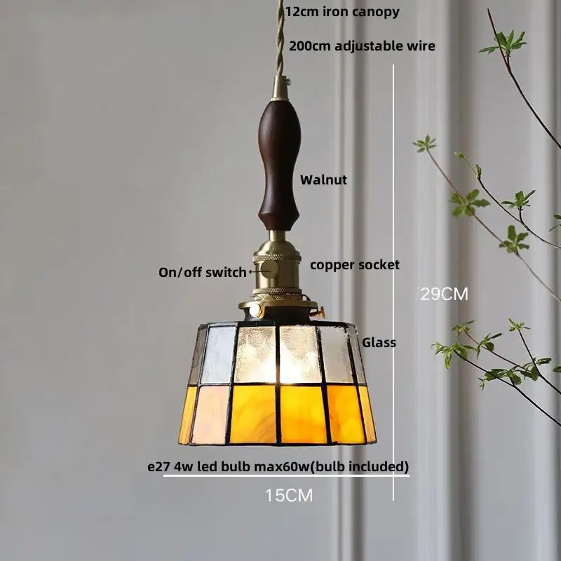 Vintage amber and cream stained glass pendant lamp with dark walnut handle brass accents and decorbites copper knob switch