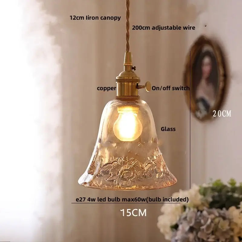Vintage amber flower glass pendant lamp with hand-blown warm-toned bell-shaped glass and brass-finished canopy