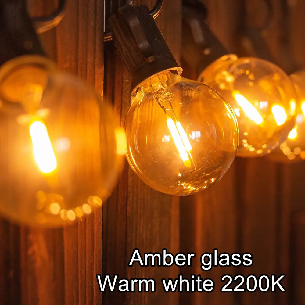 Vintage amber glass 25pcs g40 led string lights featuring warm white 2200k filament bulbs for patio and garden use