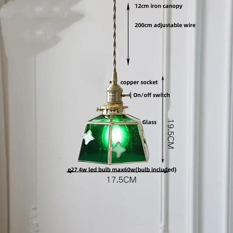 Vintage amber glass led pendant light with green glass, brass accents, and twisted iron canopy for dining room