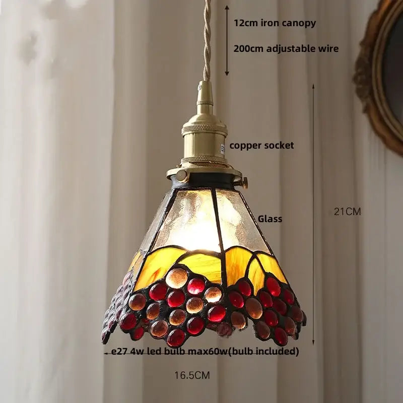 Vintage amber glass led pendant light with grape motif in brass finish ideal for dining room or kitchen use