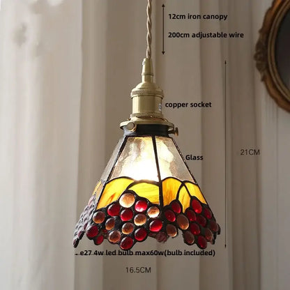 Vintage amber glass led pendant light with grape motif in brass finish ideal for dining room or kitchen use