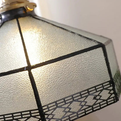 Vintage amber glass led pendant light with textured frosted panels and black leaded geometric accents for dining room
