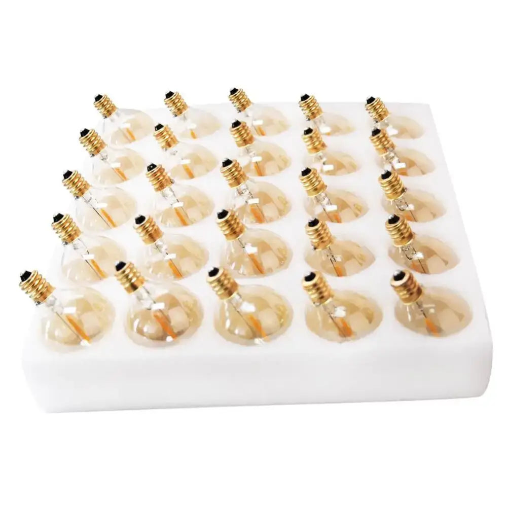 A set of 24 decorbites g40 vintage amber glass led string warm white bulbs with golden bases in a white foam tray