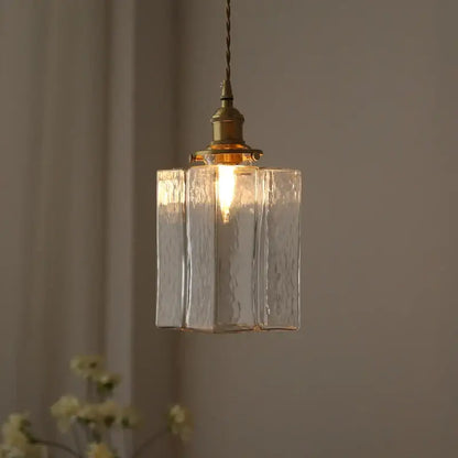 Clear textured glass pendant light with polished brass fixture and twisted cord for vintage amber glass pendant light dining room