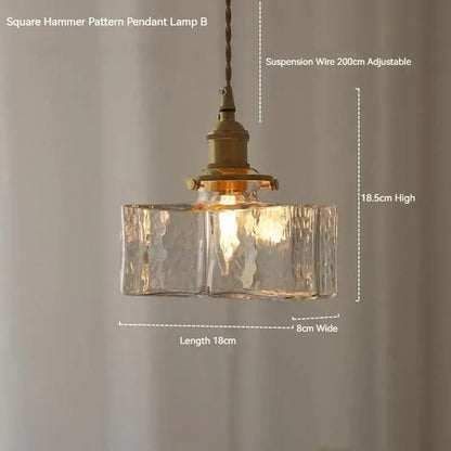 Vintage amber glass pendant light with square hammer pattern clear textured glass and polished brass hardware for dining room