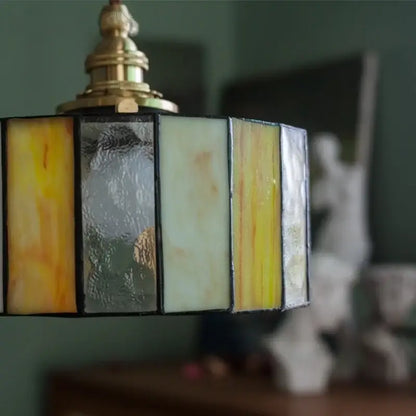 Vintage amber stained glass pendant light with brass fixture and colorful led decorbites accents for kitchen use