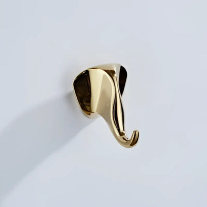 Gold-colored vintage animal brass robe hook shaped like a sleek polished elephant with a curved hanging end for decorbites brass robe hooks