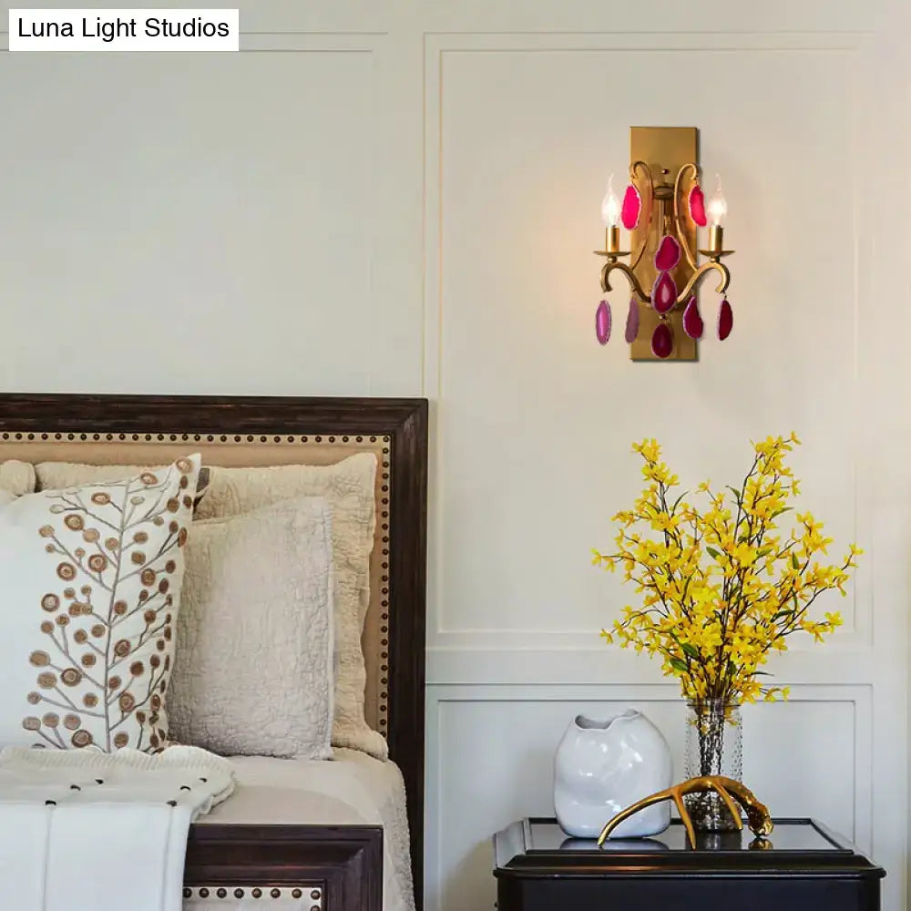 Vintage antique gold wall lamp with gold-toned sconce and dangling dark purple clear gemstone accents for bedroom