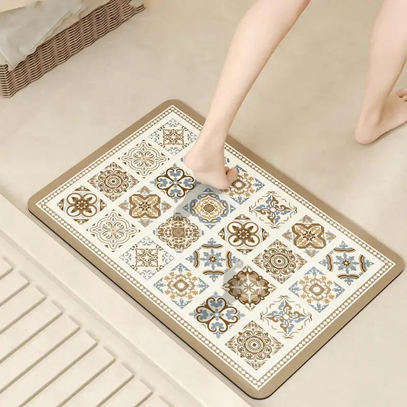 Beige and cream vintage absorbent bathroom mat with brown and blue motifs made of diatom ooze absorbent material