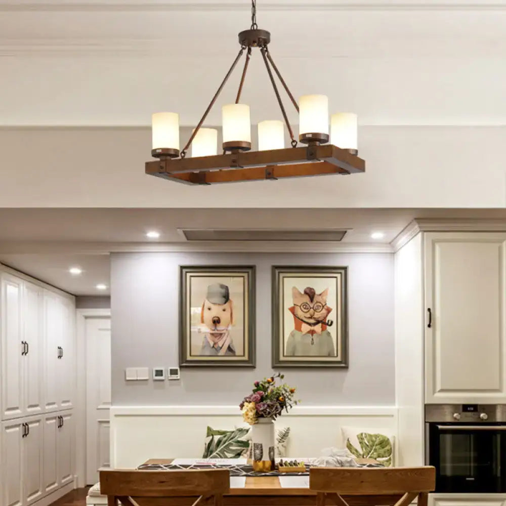 Vintage beige glass and wood light fixture dining room chandelier with six warm-toned cylindrical shades and dark metal arms