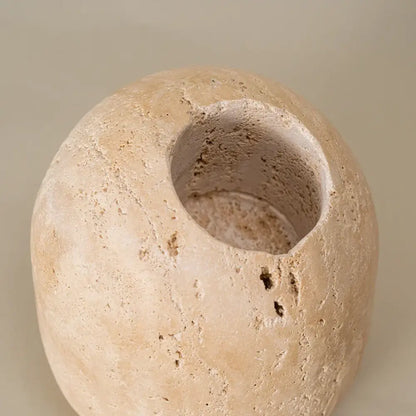 Beige travertine match holder with rough textured surface and natural imperfections for vintage living room decorbites decor