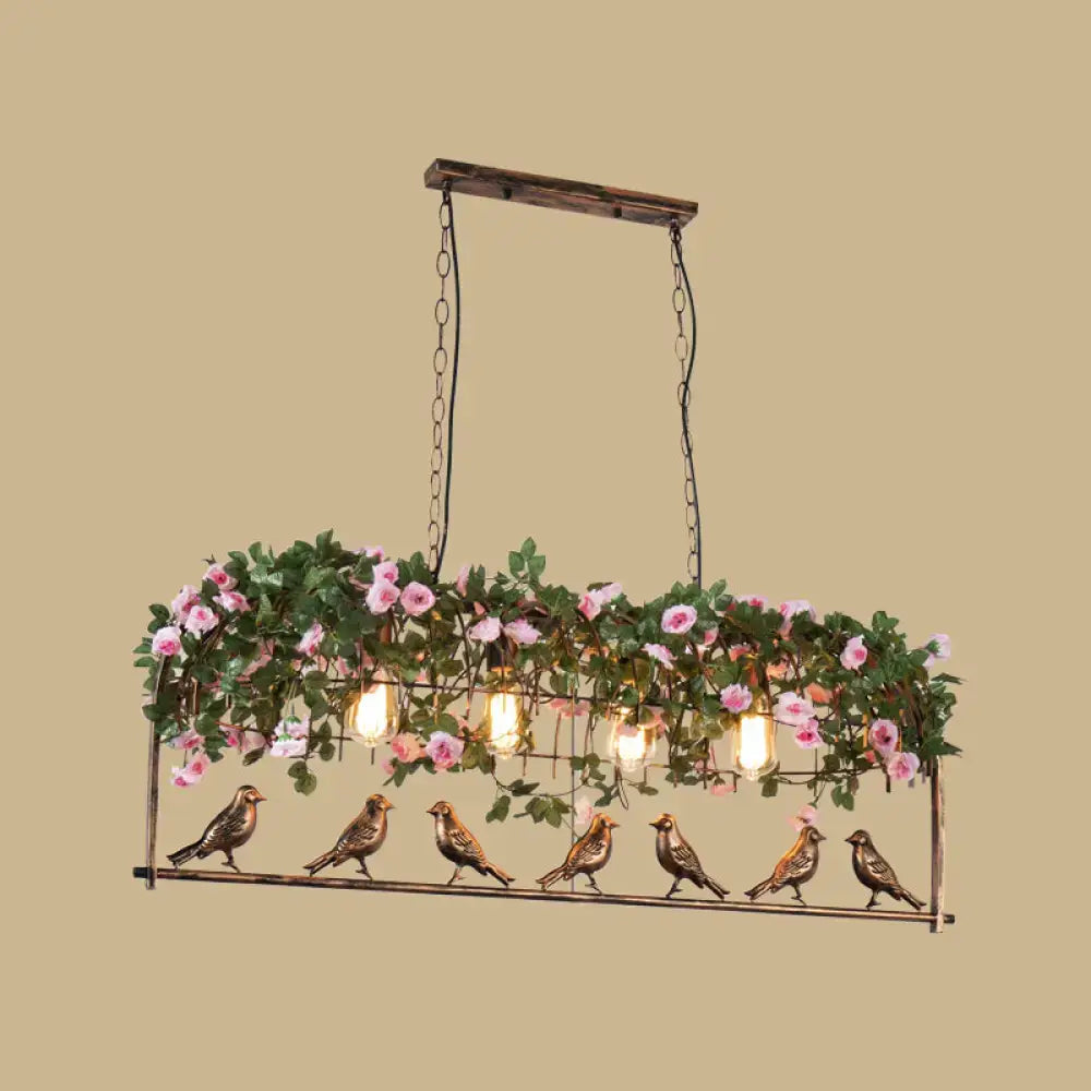 Vintage bird cage iron hanging light with rustic wooden frame pink roses green vines and six brass bird figurines