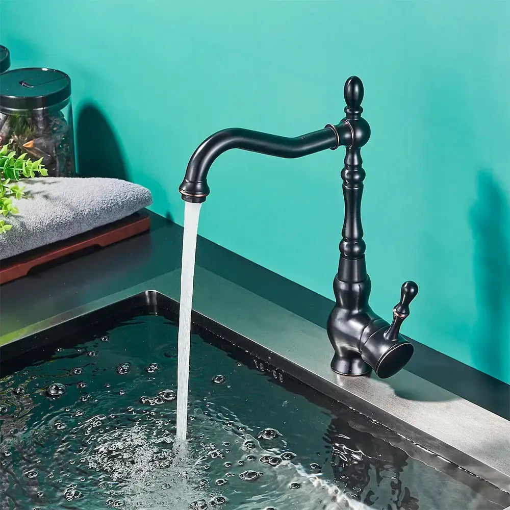 Vintage black brass faucet single handle kitchen basin mixer with black matte finish and ornate curved spout by decorbites