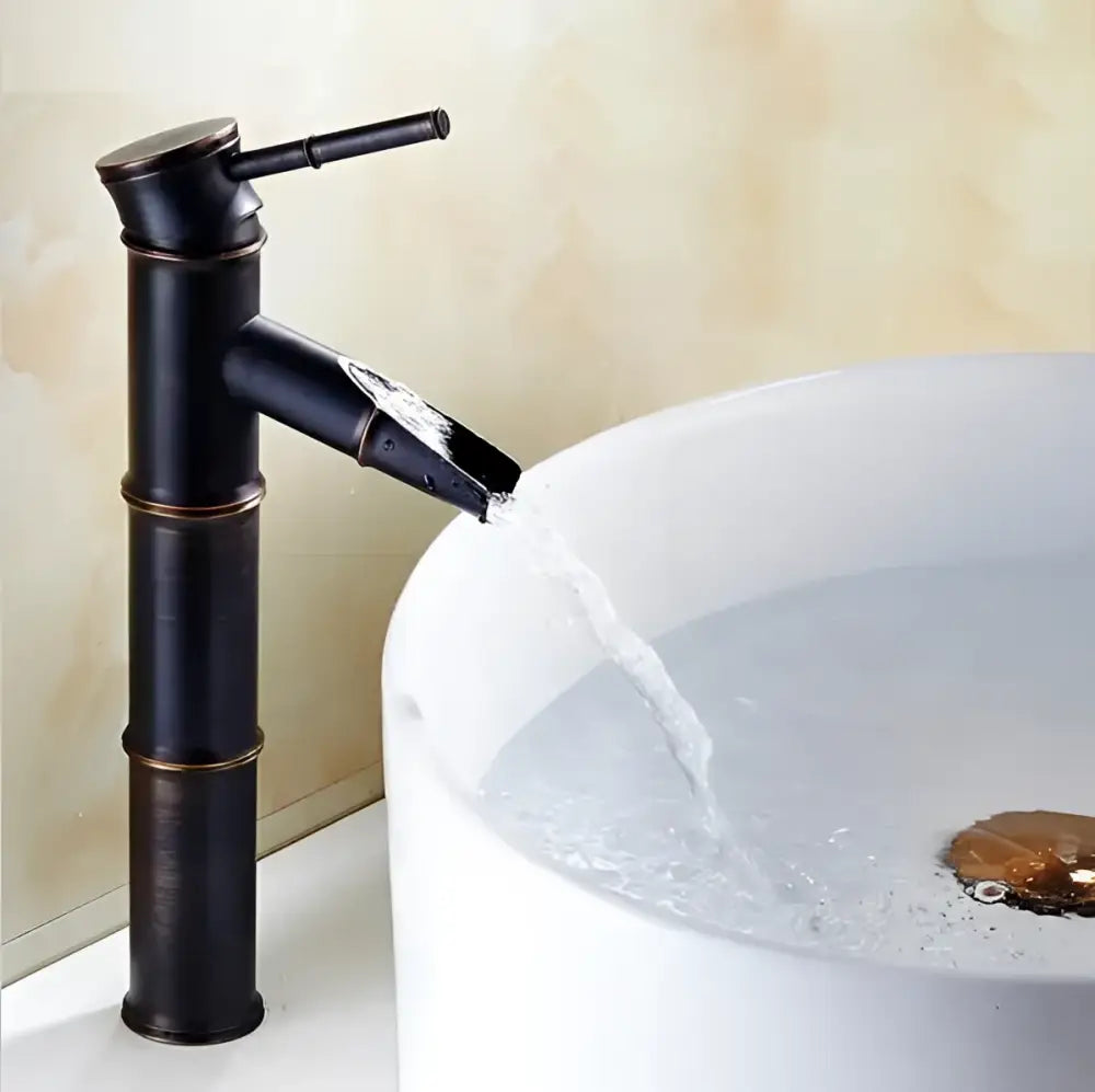 Vintage bathroom faucet featuring black bamboo-style design with matte finish and brass accents for bathroom sink tap