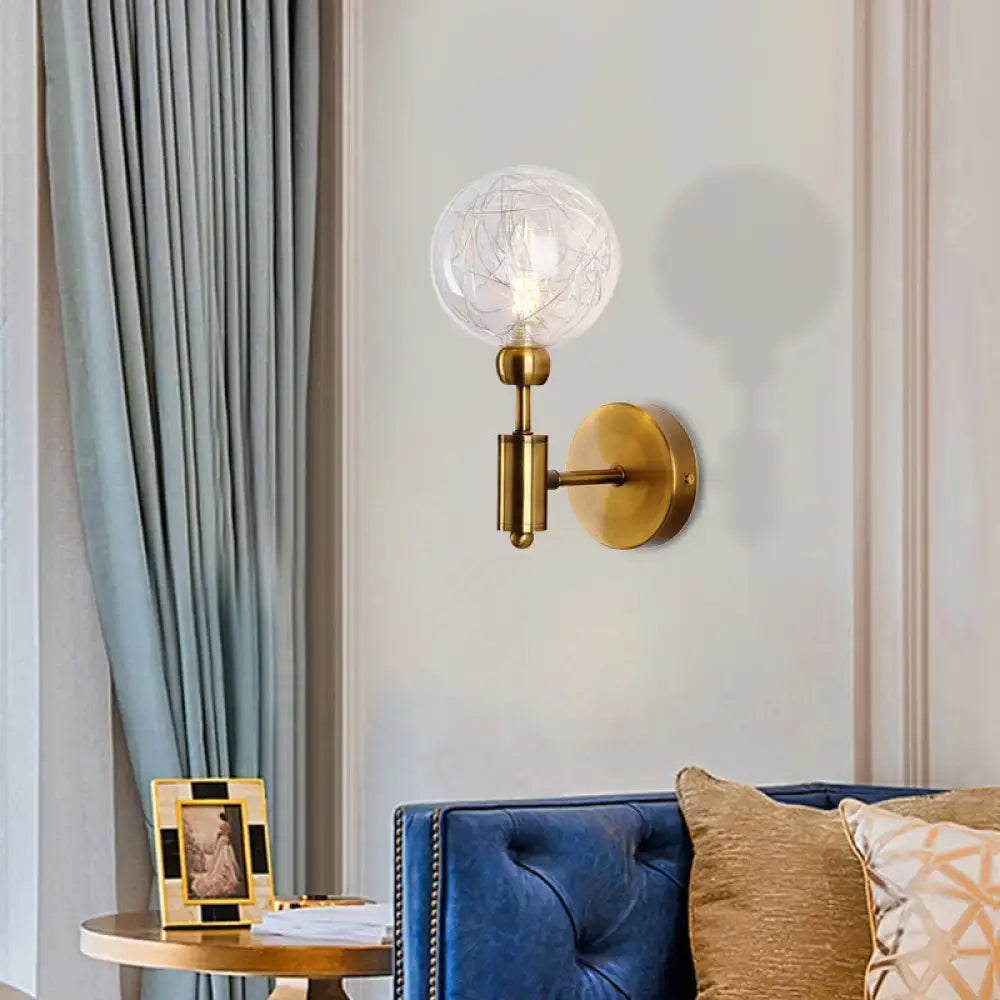 Vintage black and gold clear glass wall sconce with brass finish and intricate internal filaments for e26 e27 bulbs