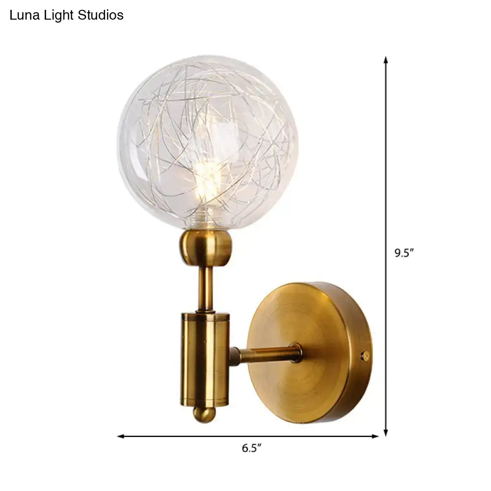 Vintage black and gold brass-finished wall sconce with clear glass globe and intricate wireframe for e26 e27 bulbs