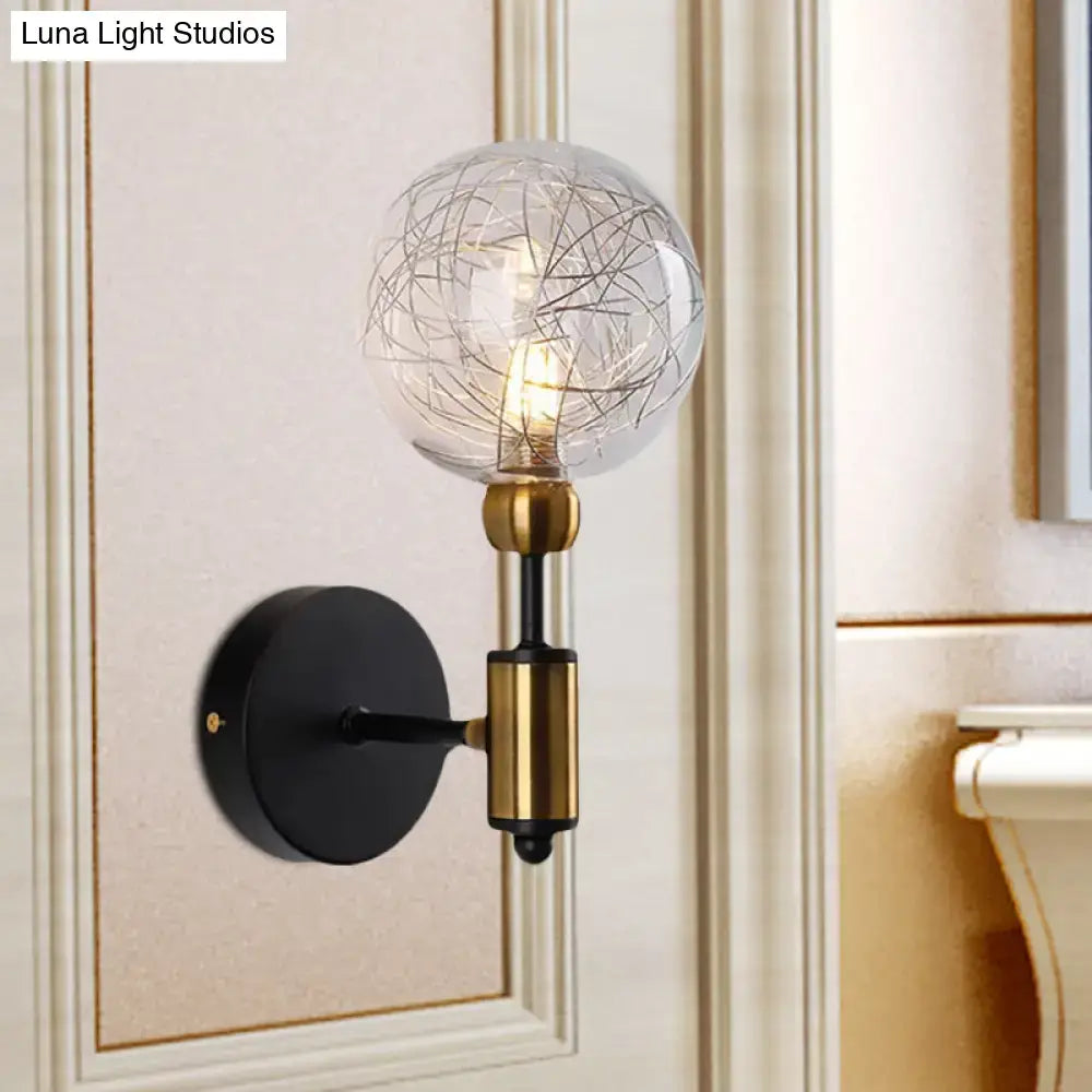 Vintage black and gold clear glass wall sconce with spherical bulb and intricate wire detailing for e26 e27 bulbs