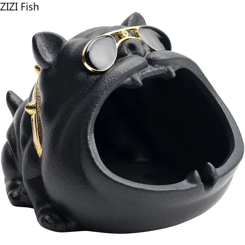 Vintage black and gold decorbites ceramic dog ashtray featuring a cast iron bulldog with gold sunglasses and chain