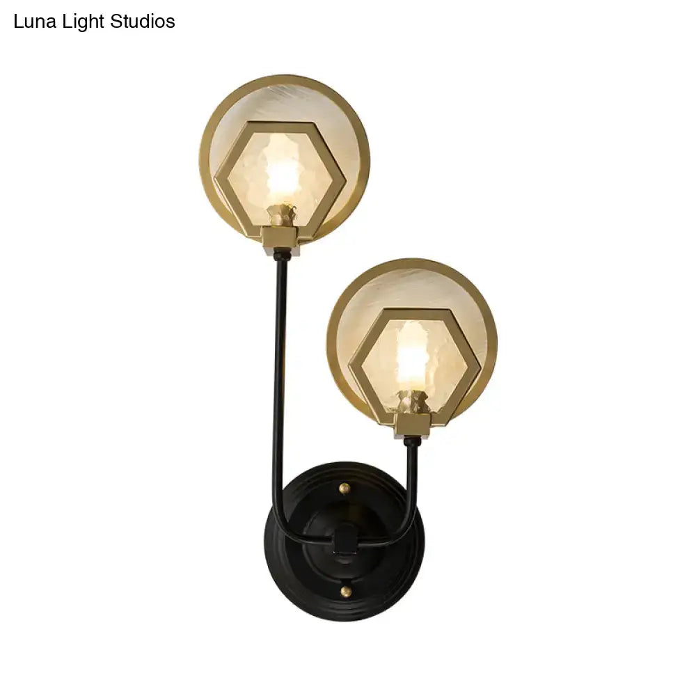 Vintage black and brass two-light wall lamp with hexagonal glass shades for elegant living space lighting