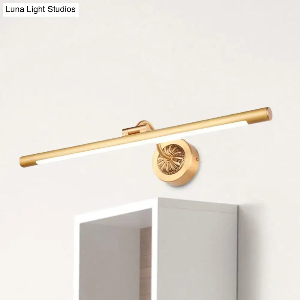 Vintage black gold wall light with gold-finished cylindrical design and ornate circular base for bathroom vanity