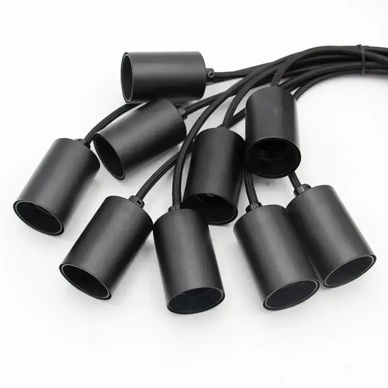 Set of black matte-finished cylindrical pendant lights with integrated cords in vintage black industrial pendant chandelier design