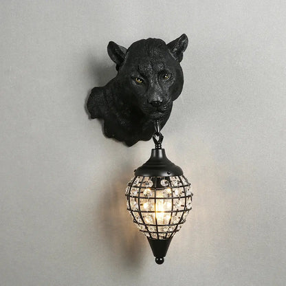 Vintage black leopard wall sconce featuring a black panther head and crystal-encrusted globe shade for decorbites leopard wall decor