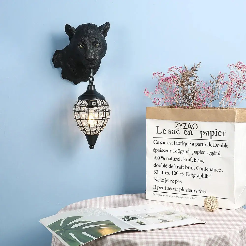 Vintage black leopard wall sconce featuring crystal-encrusted lantern style light for elegant living room decorbites leopard wall decor