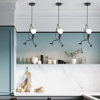 Vintage black man iron pendant light featuring three running figure black metal pendant lights with spherical bulbs